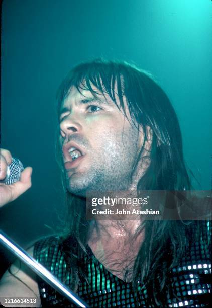 Singer Bruce Dickinson is shown performing on stage during a "live" concert appearance with Iron Maiden on January 12, 1987.