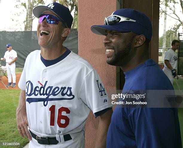 Los Angeles Dodgers Manager Jim Tracy has a laugh with recent arrival outfielder Milton Bradley during workouts at Dodgertown in Vero Beach,Florida...