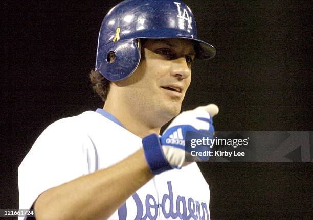 Robin Ventura of the Los Angeles Dodgers crosses the plate after a pinch-hit grand slam in the seventh inning of 8-2 victory over the Arizona...