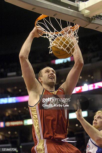 Zydrunas Ilgauskas of the Cleveland Cavaliers dunks during the NBA game between the Los Angeles Clippers and the Cleveland Cavaliers at the Staples...