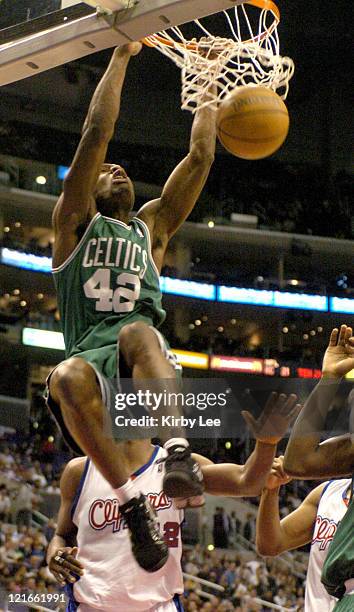 Tony Allen of the Boston Celtics dunks during the 134-127 double overtime victory over the Los Angeles Clippers at the Staples Center in Los Angeles,...