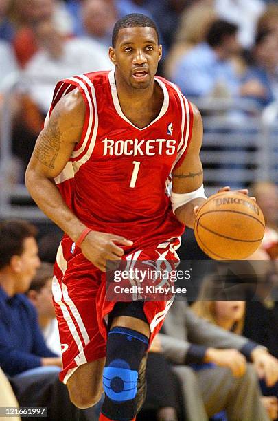 Tracy McGrady of the Houston Rockets brings the ball up the court during the NBA game between the Los Angeles Lakers and the Houston Rockets at the...