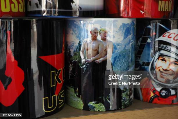 Cup with Russian President Vladimir Putin and USA President Donald Trump on display in a souvenir shop in St. Petersburg, Russia, on May 31, 2020.
