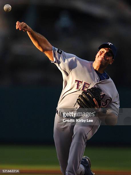 Texas Rangers starter Chris Young pitches during 5-1 loss to the Los Angeles Angels of Anaheim at Angel Stadium in Anaheim, Calif. On Monday, June...