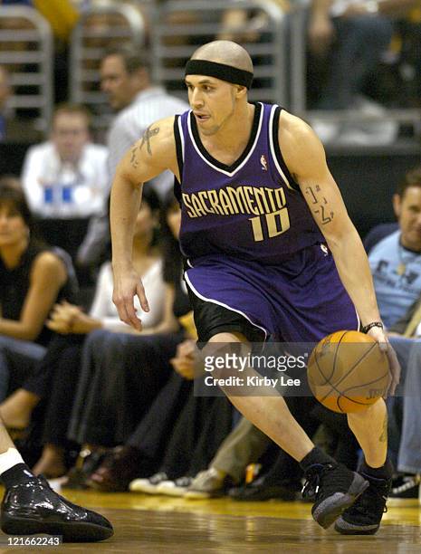 Mike Bibby of the Sacramento Kings drives into the lane during the game between the Sacramento Kings and the Los Angeles Lakers at the Staples Center...