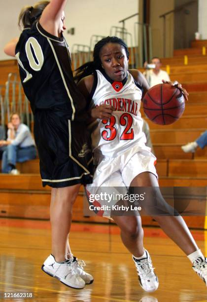 Adamaka Ajaelo of Occidental College dribbles upcourt against Samantha Porter of Nebraska Wesleyan during the nonconference women's basketball game...