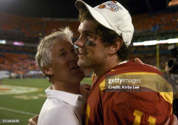 Coach Pete Carroll hugs quarterback Matt Leinart in the final minute of 55-19 victory over Oklahoma in the FedEx Orange Bowl at Pro Player Stadium in...