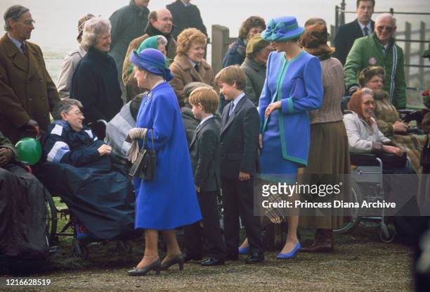 British royals Queen Elizabeth The Queen Mother , Prince Harry, Prince William and Diana, Princess of Wales , wearing a blue and turquoise suit by...