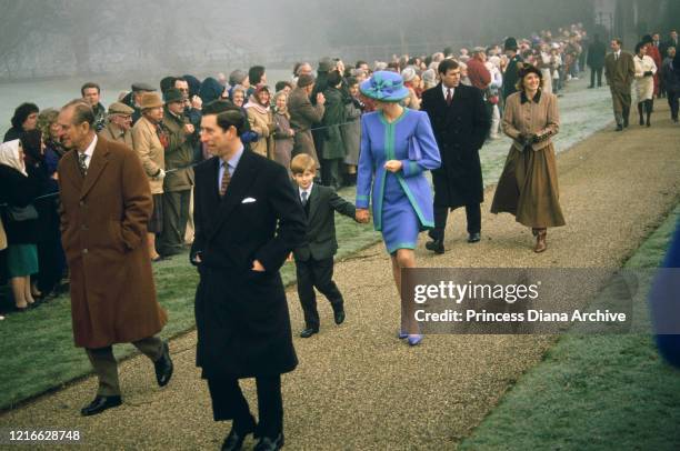 British royals Prince Philip, Duke of Edinburgh, Prince Charles, Prince Harry, Diana, Princess of Wales , wearing a blue and turquoise suit by...