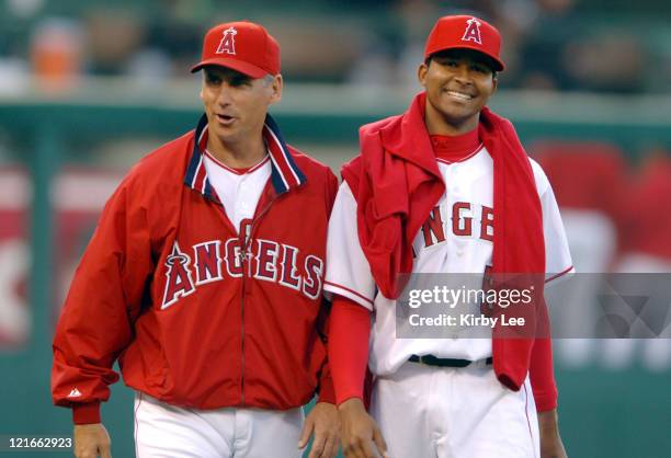 Los Angeles Angels of Anahiem starter Ervin Santana walks onto the field with pitching coach Bud Black before 4-0 victory over the Chicago White Sox...