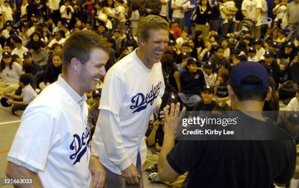 Jeff Kent of the Los Angeles Dodgers and manager Jim Tracy joke with a fan at the West San Gabriel Valley Boys & Girls Club Tuesday, January 25, 2005...