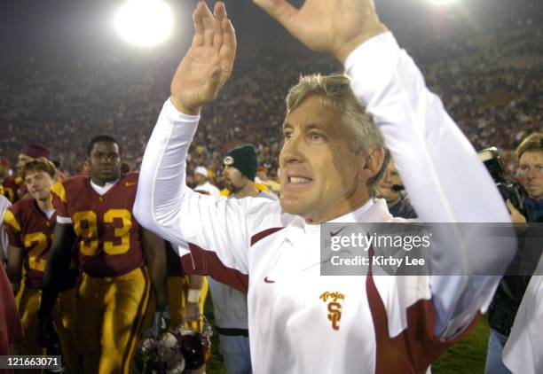 Coach Pete Carroll celebrates 49-9 victory over Arizona in Pacific-10 Conference football game at the Los Angeles Memorial Coliseum on Saturday, Nov....