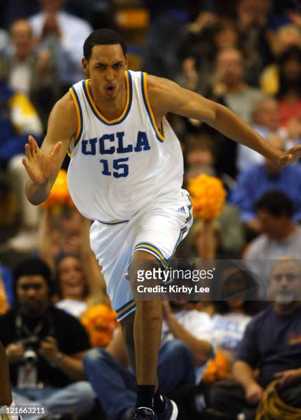 Ryan Hollins of UCLA celebrates after a dunk during 66-45 victory over USC in Pacific-10 Conference basketball game at Pauley Pavillion in Westwood,...