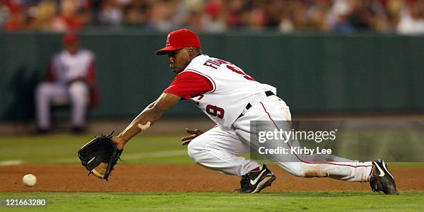 Chone Figgins of the Los Angeles Angels of Anaheim dives for a ground ball during 6-3 loss to the Seattle Mariners at Angel Stadium in Anaheim,...