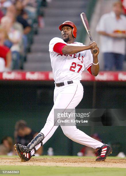 Vladimir Guerrero of the Los Angeles Angels of Anaheim hits a solo home run for his 15th homer in the sixth inning of a 7-5 loss to the Minnesota...