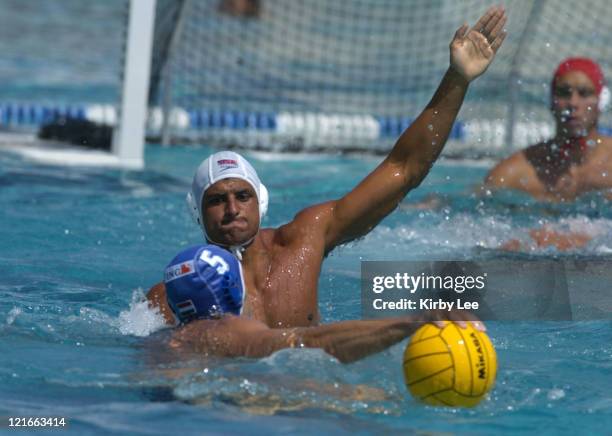 Omar Amr of USA defends against Hungary's Tamas Kasas during 11-9 victory in FINA Men's Water Polo World League match at Corona Del Mar High School...