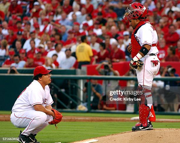 Los Angeles Angels of Anaheim catcher Bengie Molina talks with starting pitcher Bartolo Colon during 4-2 loss to the New York Yankees in MLB Division...