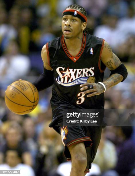 Allen Iverson of the Philadelphia 76ers brings the ball up the court during the NBA game between the Los Angeles Lakers and the Philadelphia 76ers at...