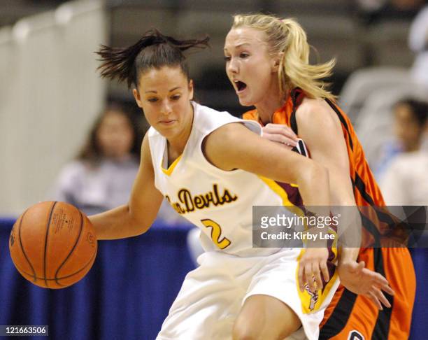 Reagan Pariseau of Arizona State is guarded by Mandy Close of Oregon State during Pacific-10 Tournament Quarterfinal at HP Pavilion in San Jose,...