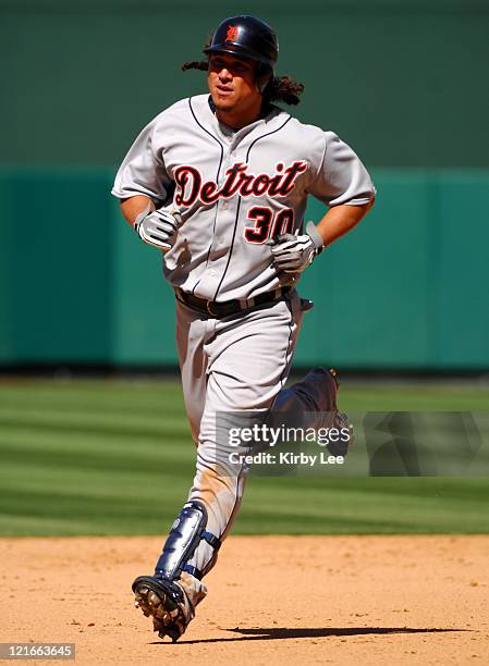 Magglio Ordonez of the Detroit Tigers circles the bases after hitting a two-run homerun in the ninth inning of 9-8 loss to the Los Angeles Angels of...