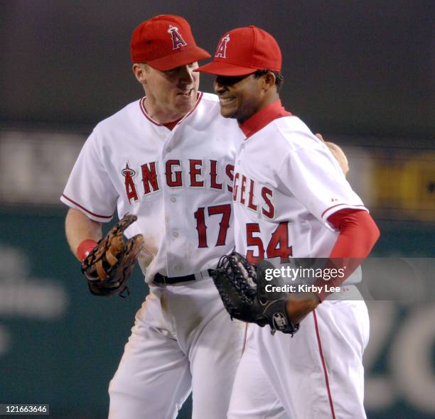 Los Angeles Angels of Anahiem starter Ervin Santana is congratulated by Darin Erstad after 4-0 victory over the Chicago White Sox at Angel Stadium in...