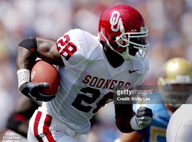 Oklahoma sophomore running back Adrian Peterson heads up field during 41-24 loss to UCLA at the Rose Bowl in Pasadena, Calif. On Saturday, Sept. 17,...