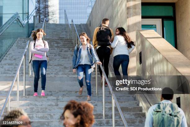 college student descent outdoor staircase - community college campus stock pictures, royalty-free photos & images