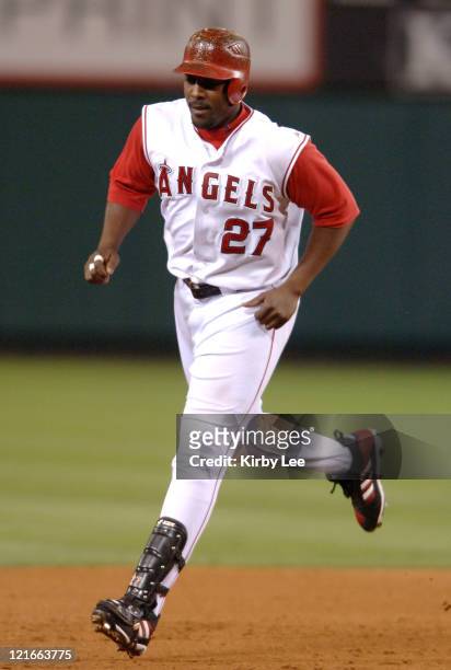 Vladimir Guerrero of the Los Angeles Angels of Anaheim rounds the bases after a grand-slam home run in the seventh inning of 9-2 victory over the...