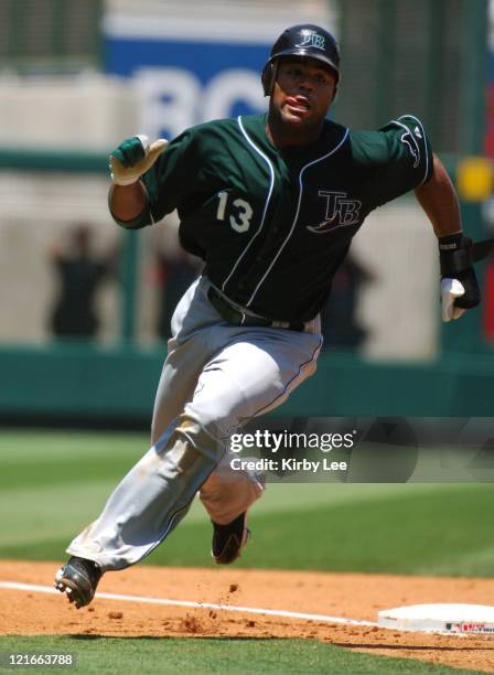 Carl Crawford of the Tampa Bay Devil Rays rounds third base to score in the fifth inning of 7-5 loss to the Los Angeles Angels of Anaheim at Angel...