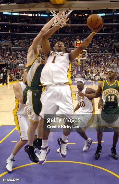 Caron Butler of the Los Angeles Lakers takes a shot during the game between the Seattle SuperSonics and the Los Angeles Lakers at the Staples Center...