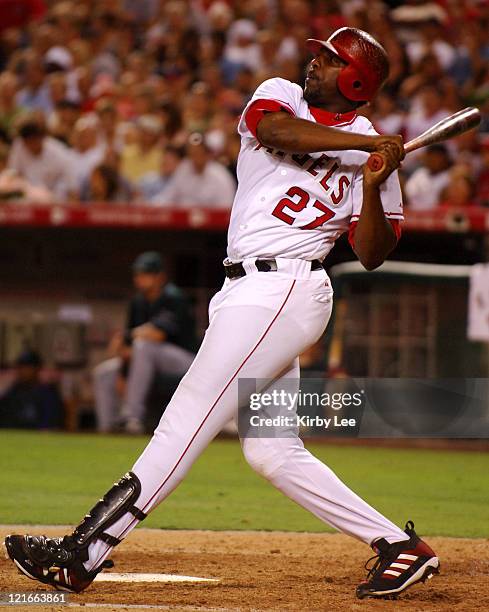 Vladimir Guerrero of the Los Angeles Angels of Anaheim hits a solo home run in the sixth inning of 4-0 victory over the Tampa Bay Devil Rays at Angel...