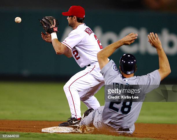 Adam Kennedy of the Los Angeles Angels of Anaheim retires Raul Ibanez of the Seattle Mariners in a force out at second base in the ninth inning of...