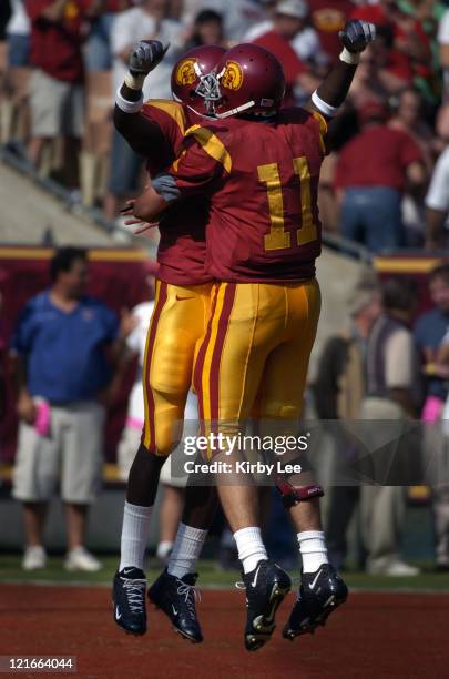 Receiver Dwayne Jarrett and quarterback Matt Leinart celebrate 16-yard touchdown completion during 23-17 victory over Cal at the Los Angeles Memorial...