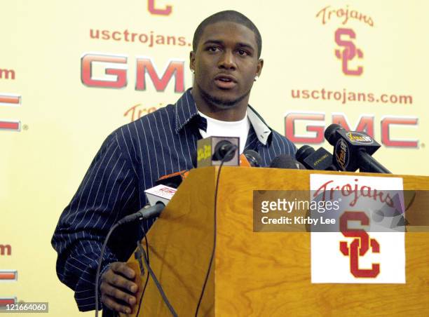 Junior tailback Reggie Bush, the 2005 Heisman Trophy winner, announces his decision to make himself eligible for the NFL draft at press conference at...