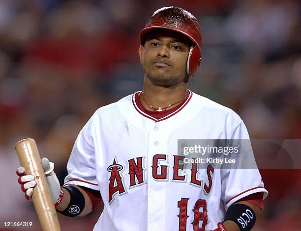 Orlando Cabrera of the Los Angeles Angels of Anaheim walks off the field dejectedly after striking out for the final out of 5-2 loss to the Texas...