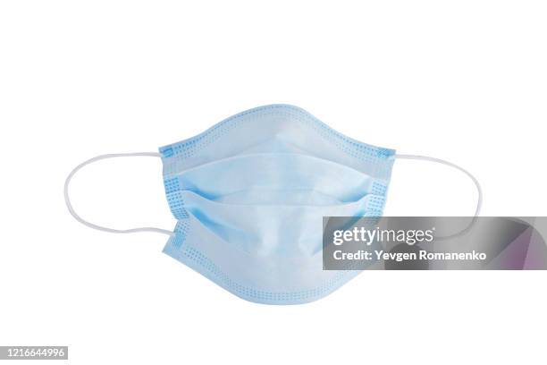 surgical mask isolated on white background - schutzmaske stock-fotos und bilder