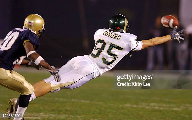 Colorado State Dustin Osborn dives for a reception during 51-30 loss to Navy in the Poinsettia Bowl at Qualcomm Stadium in San Diego, Calif. On...
