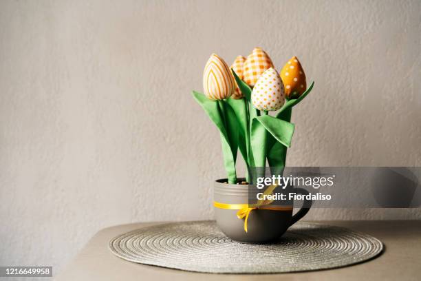 homemade fabric flowers in the shape of tulips. easter concept - unwanted present stock pictures, royalty-free photos & images