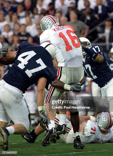 Ohio State quarterback Craig Krenzel gets hit and injured in the first half against Penn State at Beaver Stadium, University Park, Pennsylvaina,...