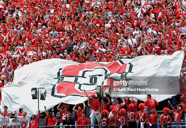 Ohio State fans cheers their team on as they take the field at Ohio Stadium in Columbus, Ohio, September 27, 2003.
