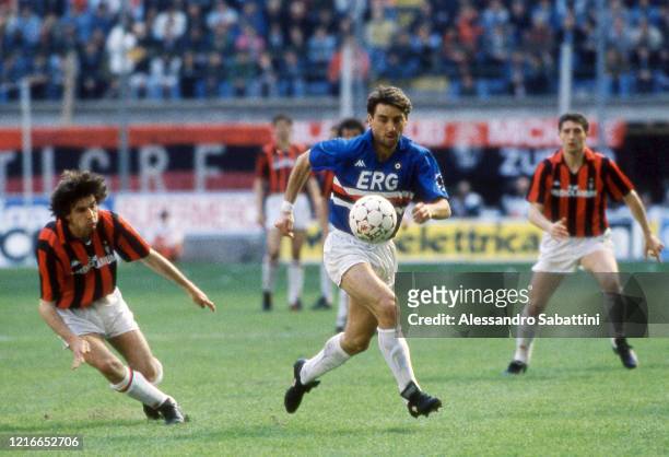 Filippo Galli of AC Milan competes for the ball with Roberto Mancini of Sampdoria during the Seria A match between AC MIlan and Sampdoria, Italy.