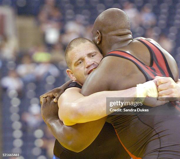 Rulon Gardner has Dremiel Byers in a clinch in 120 kg Greco-Roman finals at the Olympic Trials in Indianapolis, Indiana.