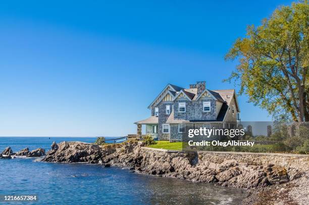 luxury waterfront new england house, kennebunkport, maine. clear blue sky. - waterfront house stock pictures, royalty-free photos & images