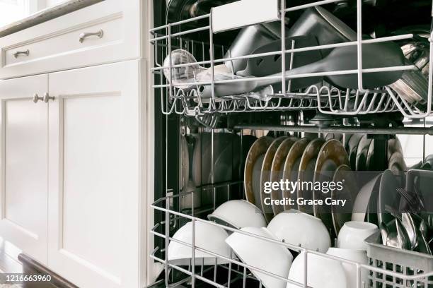 dirty dishes in dishwasher - dishwasher stock pictures, royalty-free photos & images