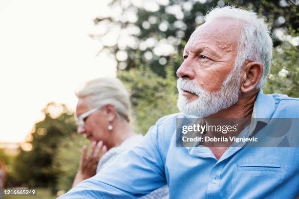serious mature man looking in distance - ignoring stock pictures, royalty-free photos & images