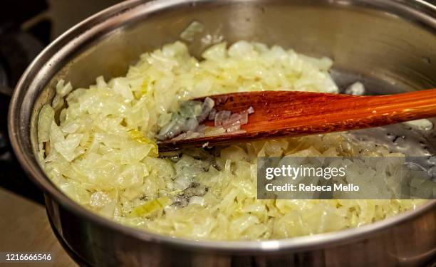 oil and chopped onion in the pan - fried stock pictures, royalty-free photos & images