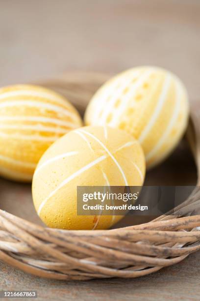 yellow egg with patterns - kurkuma ストックフォトと画像