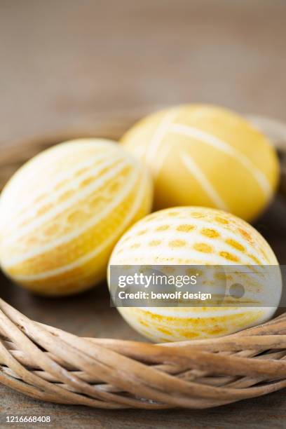 yellow egg with patterns - kurkuma ストックフォトと画像