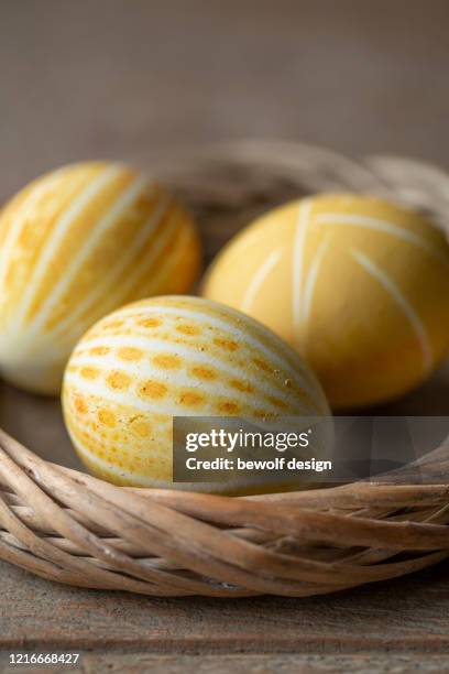 yellow egg with patterns - kurkuma ストックフォトと画像