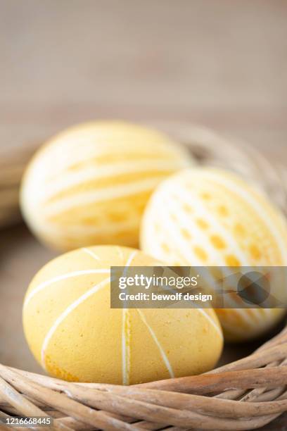 yellow egg with patterns - kurkuma ストックフォトと画像